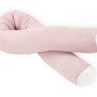 Die KraftKids GmbH Wickeltischrolle Musselin in rosa mit goldenen Punkten hat eine U-Form und weiße Enden, die kreuz und quer auf weißem Hintergrund dargestellt sind.