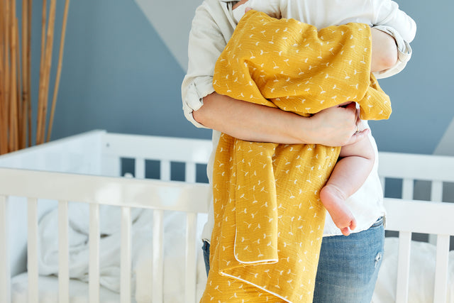 Yellow dandelion muslin baby blanket